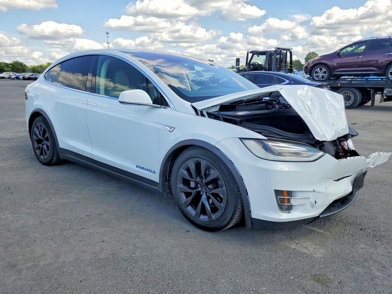 5YJXCBE21GF016554 · 2016 TESLA MODEL X · 4/13
