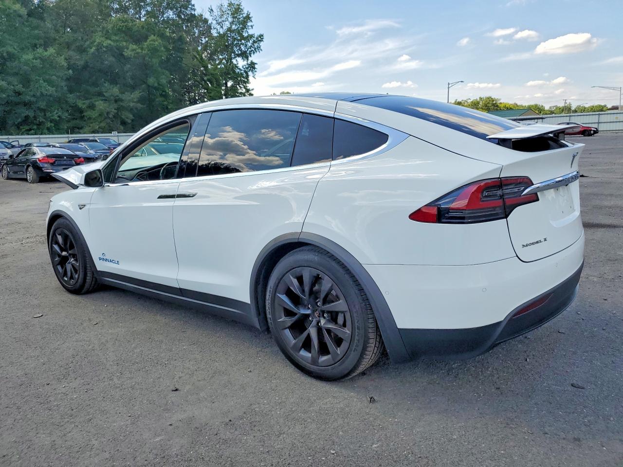 5YJXCBE21GF016554 · 2016 TESLA MODEL X · 2/13