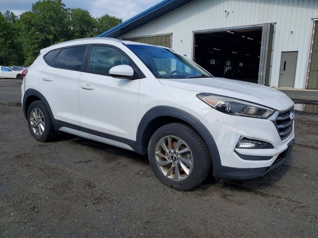 KM8J3CA40JU713498 · 2018 HYUNDAI TUCSON · 4/13