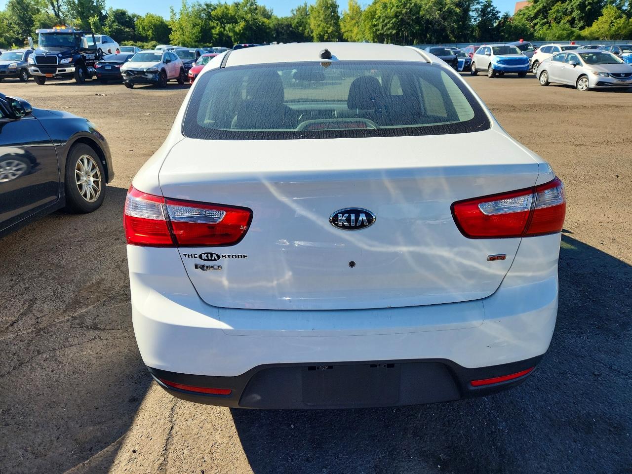 KNADM4A36D6305248 · 2013 KIA RIO · 6/13
