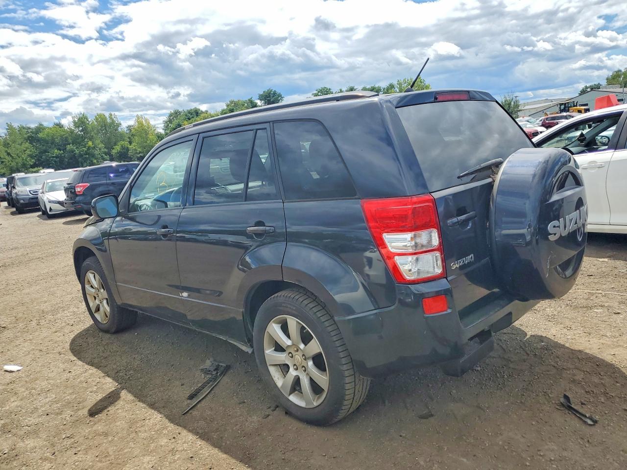 JS3TD0D72C4101208 · 2012 SUZUKI GRAND VITARA · 2/13