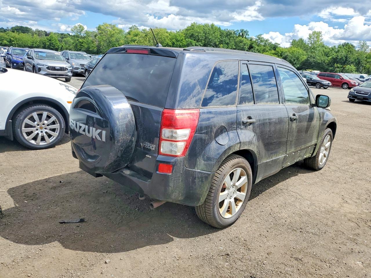 JS3TD0D72C4101208 · 2012 SUZUKI GRAND VITARA · 3/13