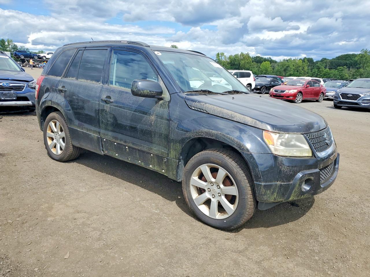 JS3TD0D72C4101208 · 2012 SUZUKI GRAND VITARA · 4/13