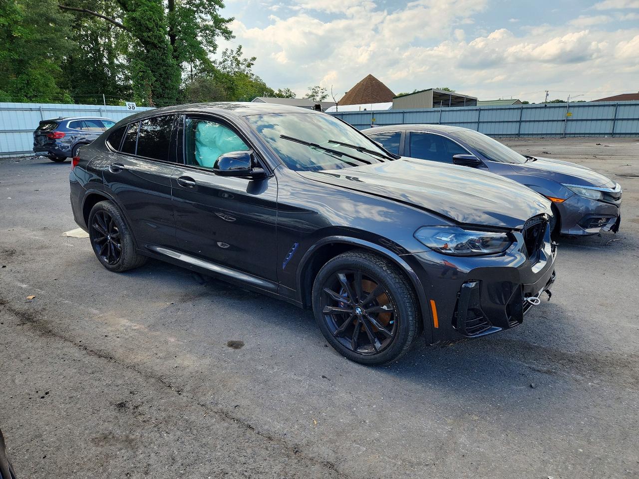 5UX43DT06N9J98273 · 2022 BMW X4 · 4/14