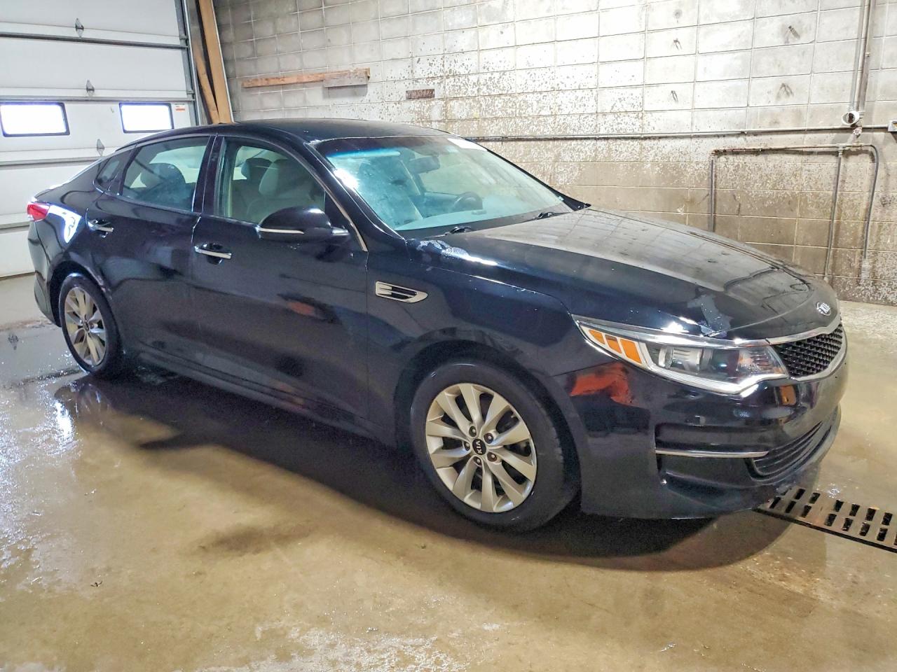 5XXGT4L34GG073352 · 2016 KIA OPTIMA · 4/12