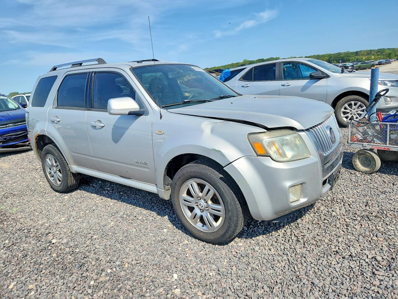 4M2CU971X8KJ40409 · 2008 MERCURY MARINER · 4/12