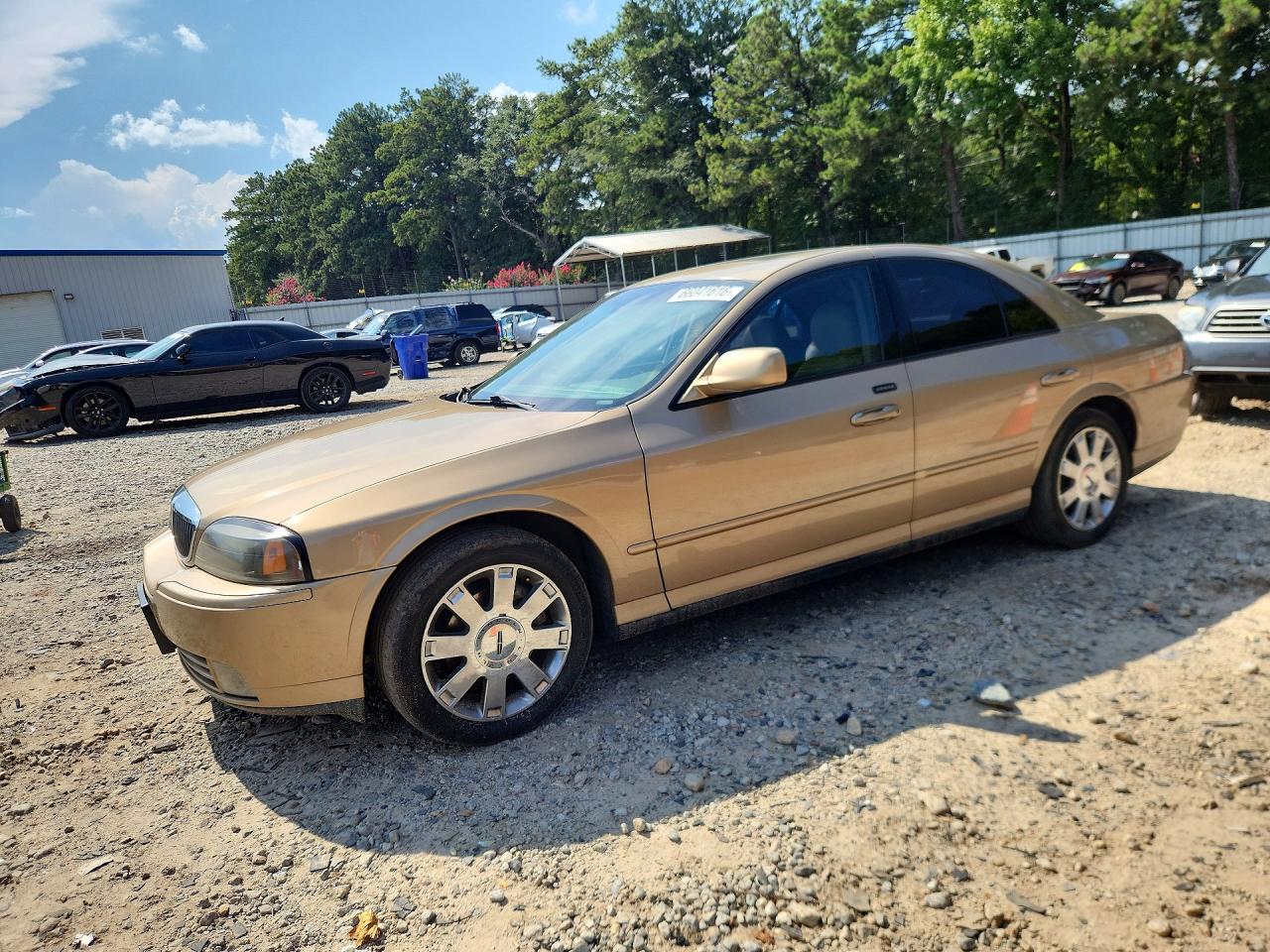 1LNHM87A25Y615979 · 2005 LINCOLN LS