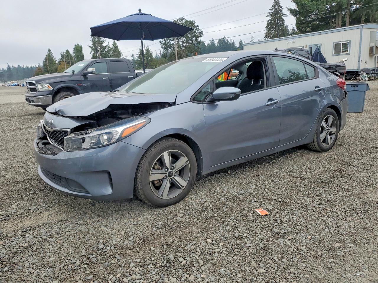 3KPFL4A73JE250930 · 2018 KIA FORTE