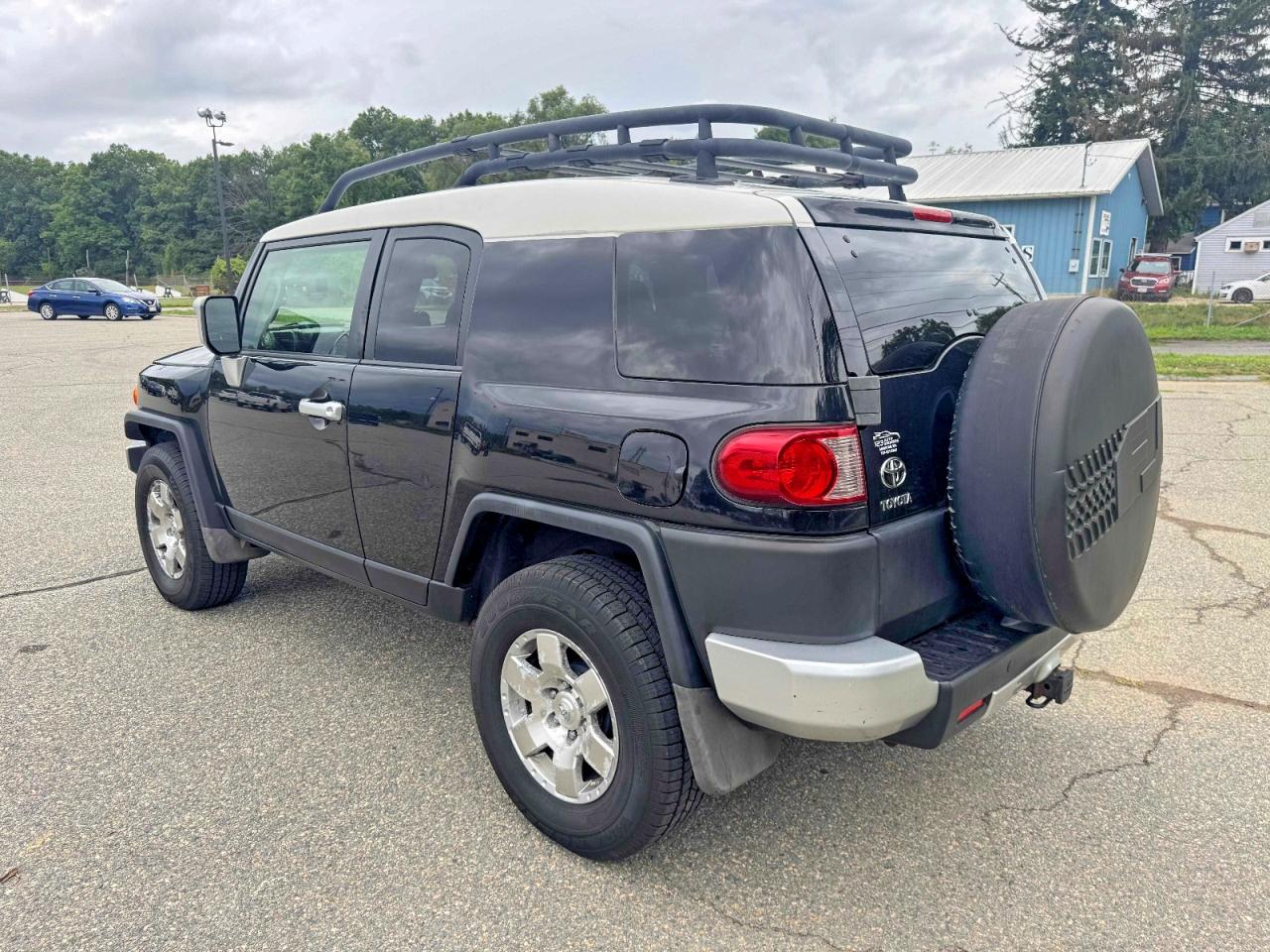 JTEBU11F58K032394 · 2008 TOYOTA FJ CRUISER · 3/11