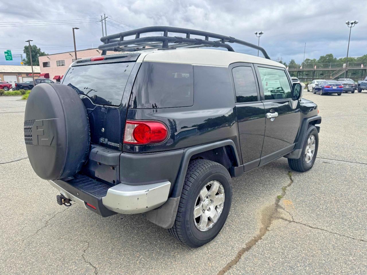 JTEBU11F58K032394 · 2008 TOYOTA FJ CRUISER · 4/11