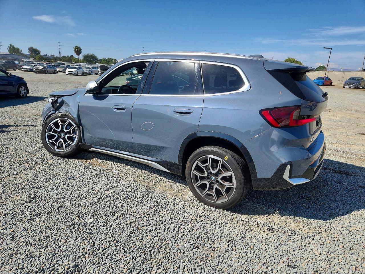 WBX73EF05P5W47990 · 2023 BMW X1 · 2/14