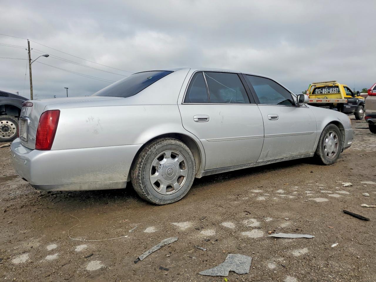 1G6KD54Y42U303128 · 2002 CADILLAC DEVILLE · 3/12