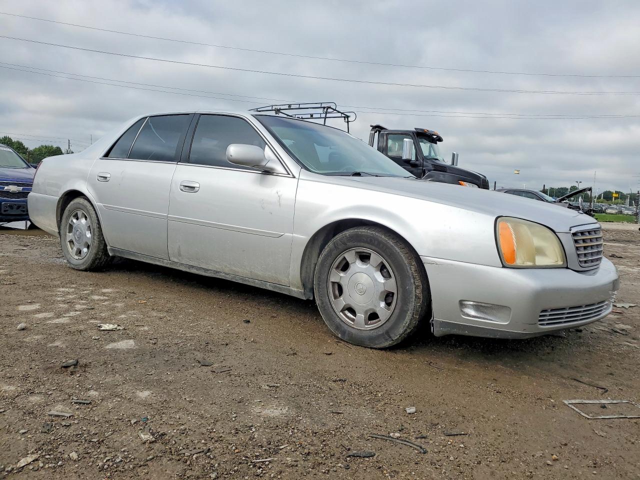 1G6KD54Y42U303128 · 2002 CADILLAC DEVILLE · 4/12