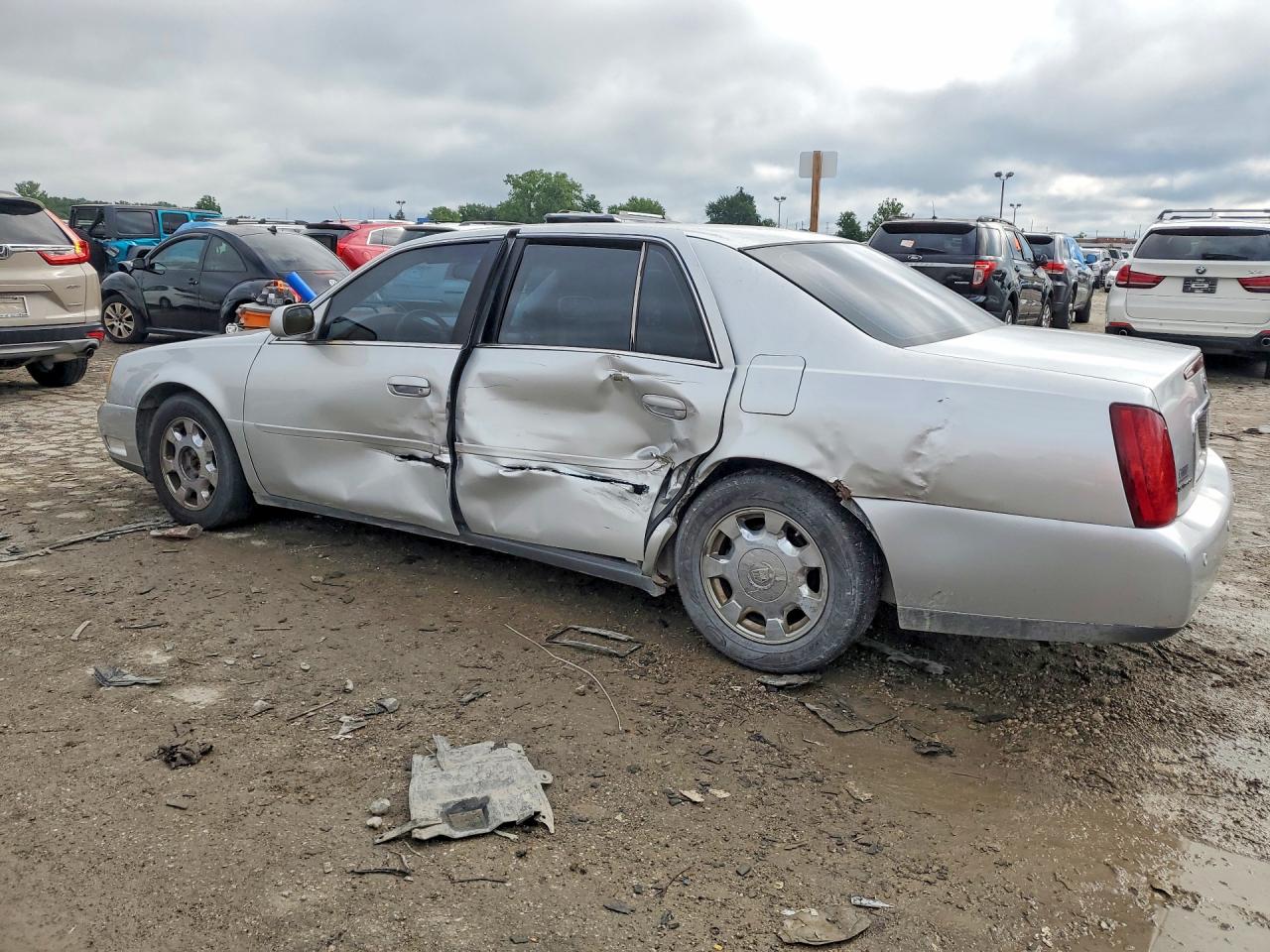 1G6KD54Y42U303128 · 2002 CADILLAC DEVILLE · 2/12