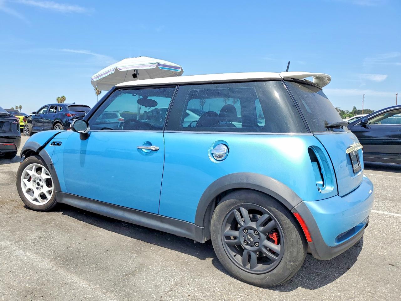 WMWRE33435TD94589 · 2005 MINI COOPER · 2/12