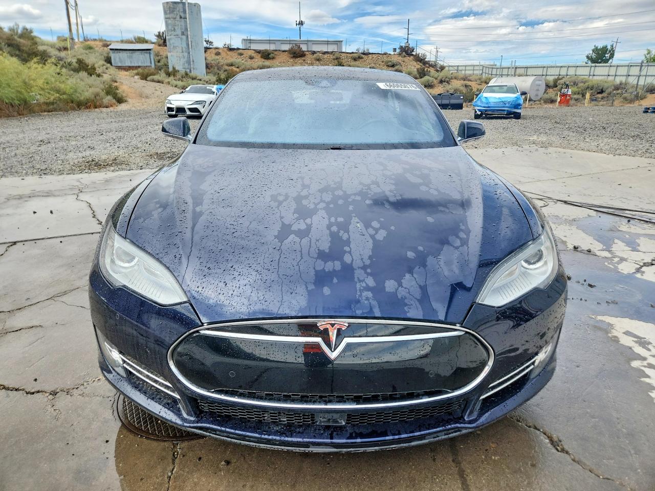 5YJSA1H29EFP65556 · 2014 TESLA MODEL S · 5/12