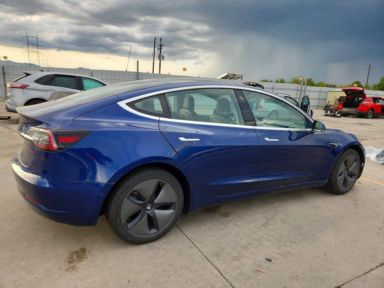 5YJ3E1EB1JF064419 · 2018 TESLA MODEL 3 · 3/13