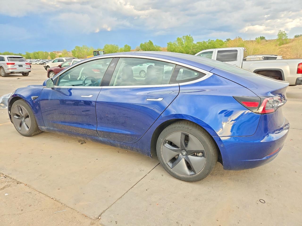 5YJ3E1EB1JF064419 · 2018 TESLA MODEL 3 · 2/13