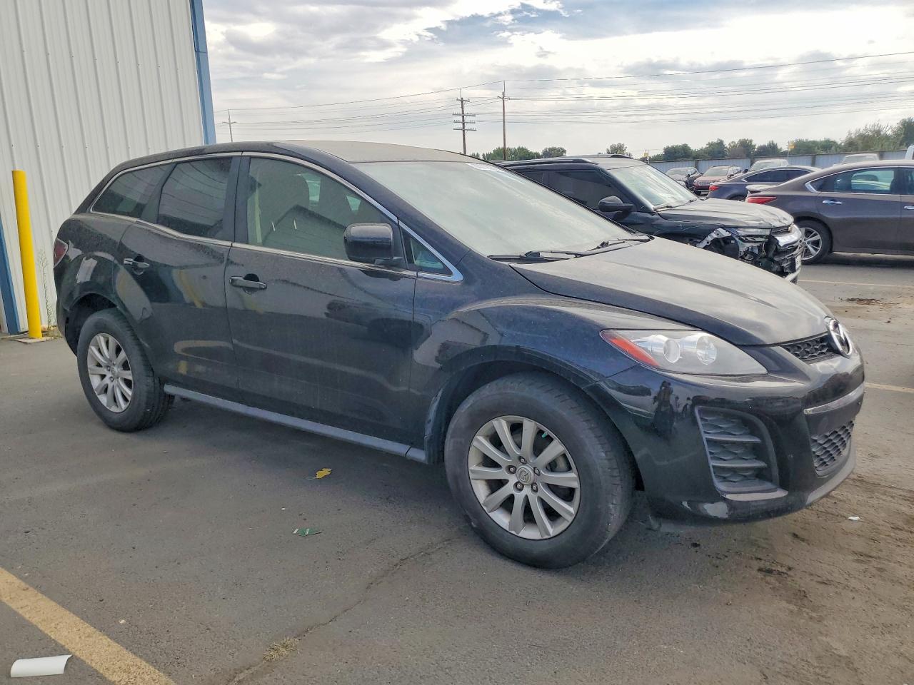 JM3ER2BM9B0387858 · 2011 MAZDA CX-7 · 4/13
