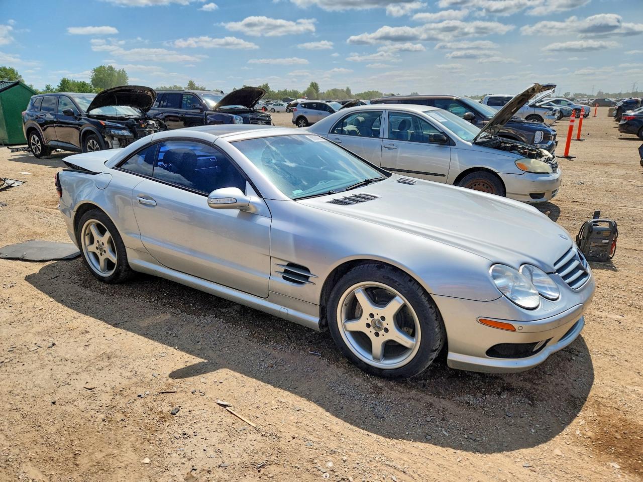WDBSK75F53F029518 · 2003 MERCEDES-BENZ SL · 4/13