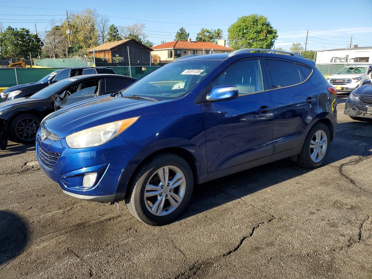 KM8JU3AC0DU766565 · 2013 HYUNDAI TUCSON