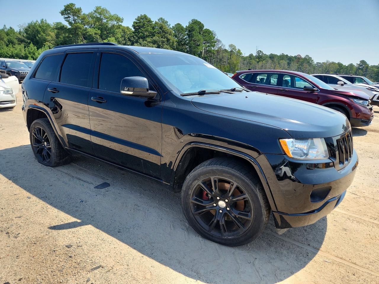 1J4RR5GT2BC581667 · 2011 JEEP GRAND CHEROKEE · 4/12