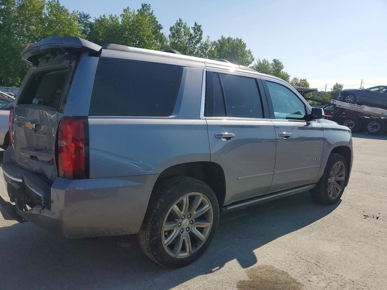 1GNSKCKC1JR300551 · 2018 CHEVROLET TAHOE · 3/13