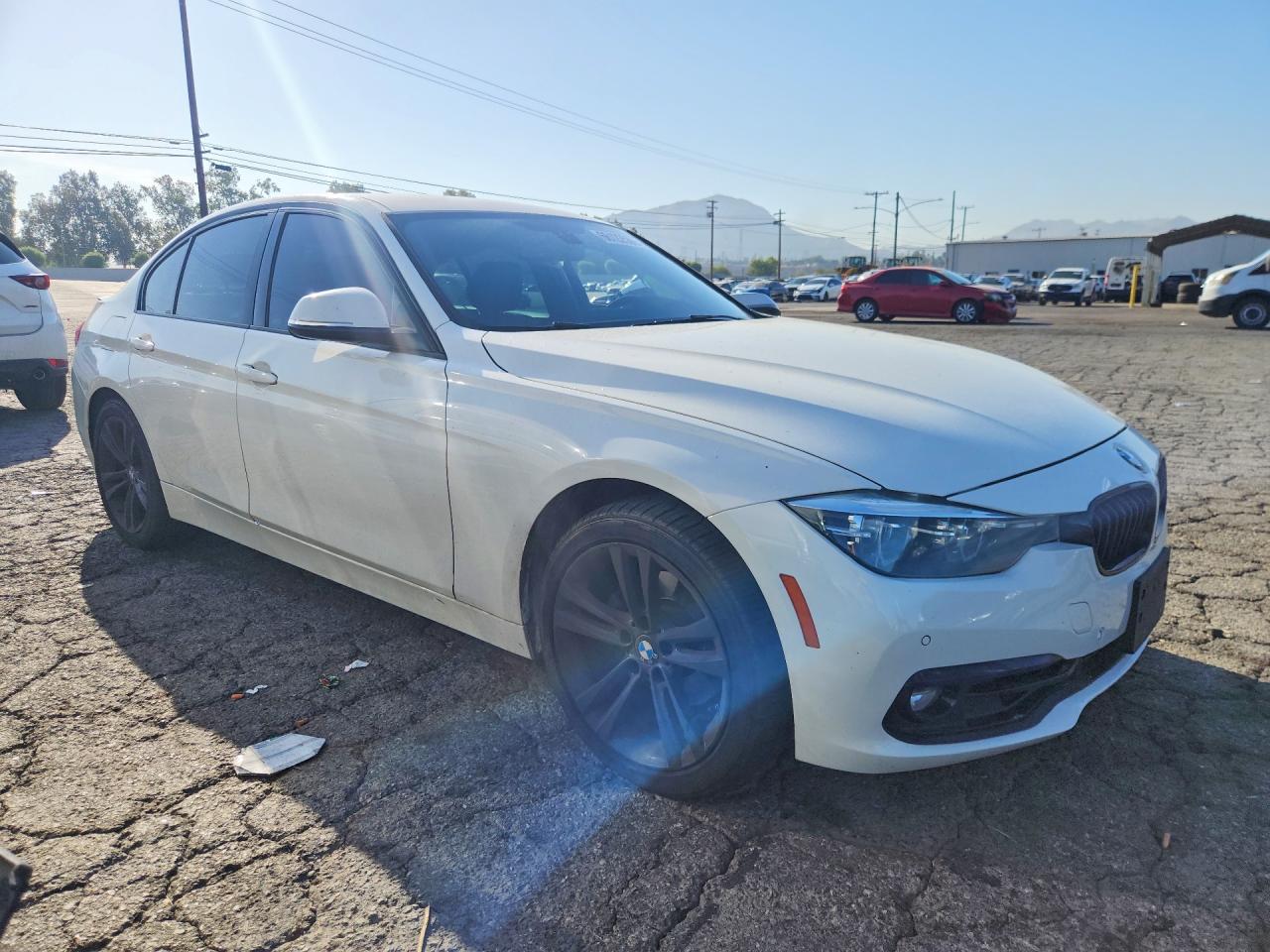 WBA8B9G57JNU98184 · 2018 BMW 330 · 4/12