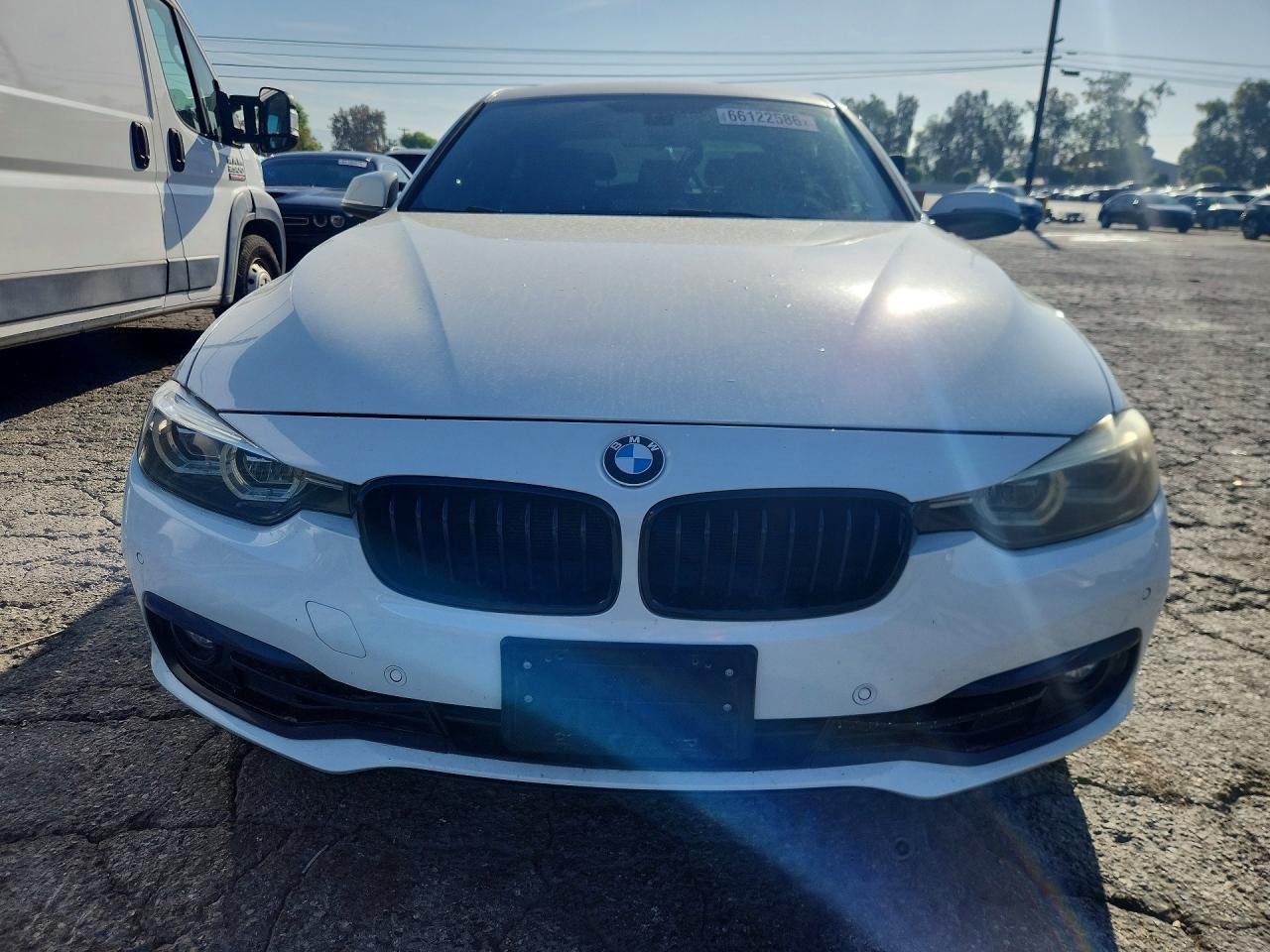 WBA8B9G57JNU98184 · 2018 BMW 330 · 5/12