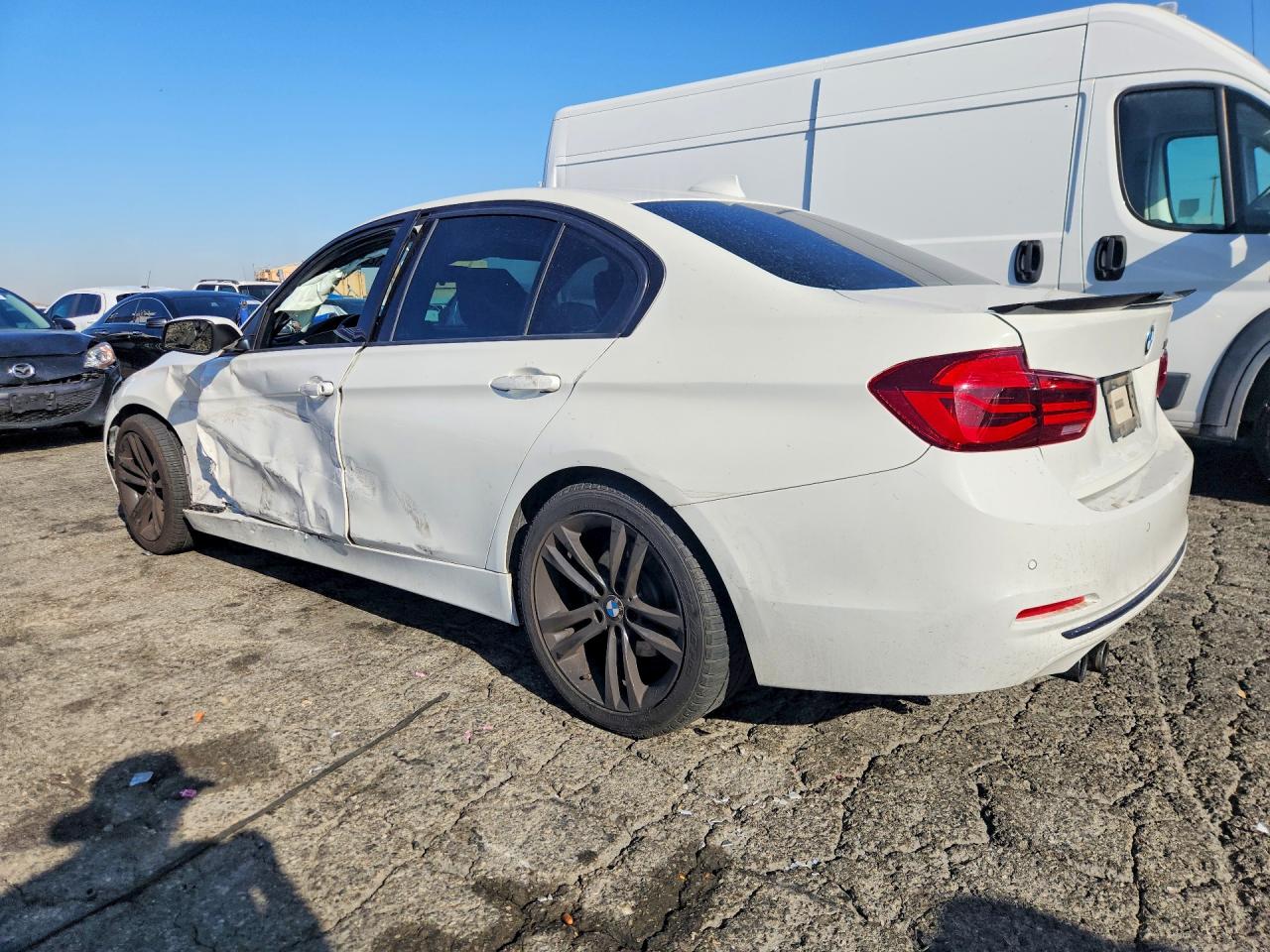 WBA8B9G57JNU98184 · 2018 BMW 330 · 2/12