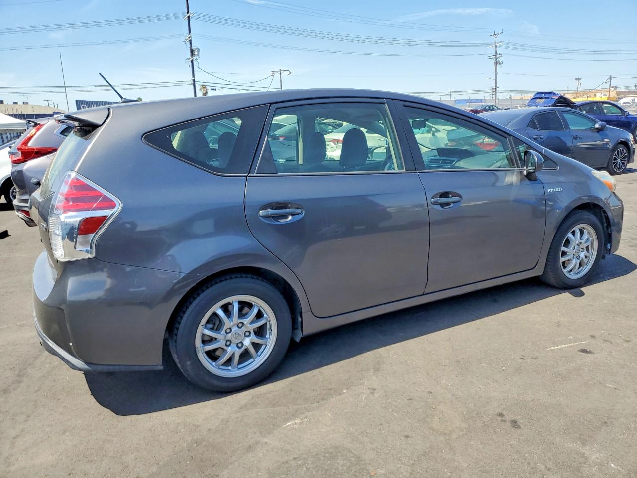 JTDZN3EUXFJ031698 · 2015 TOYOTA PRIUS V · 3/12