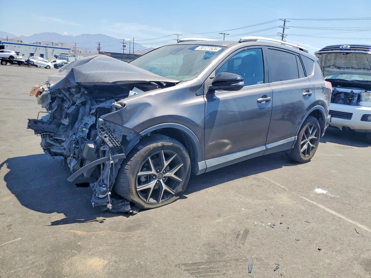 2T3NFREV4GW302233 · 2016 TOYOTA RAV4