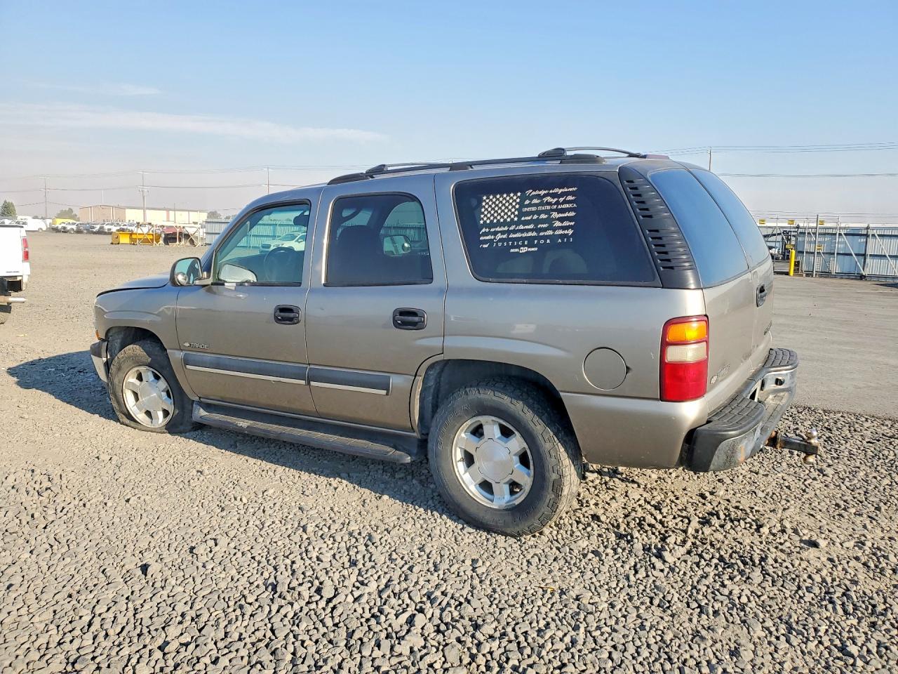 1GNEK13V63R122754 · 2003 CHEVROLET TAHOE · 2/13