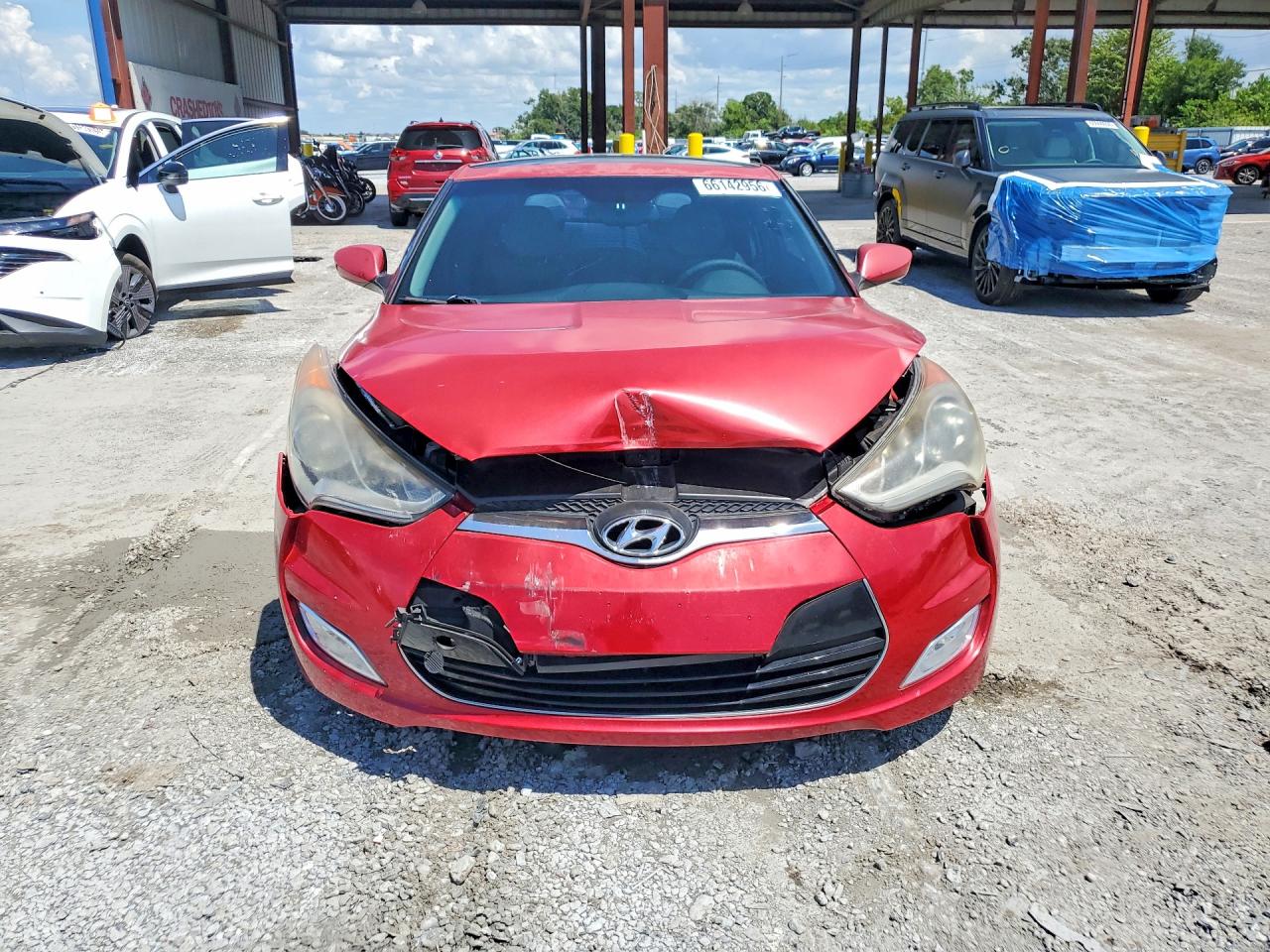 KMHTC6AD4CU071624 · 2012 HYUNDAI VELOSTER · 5/13