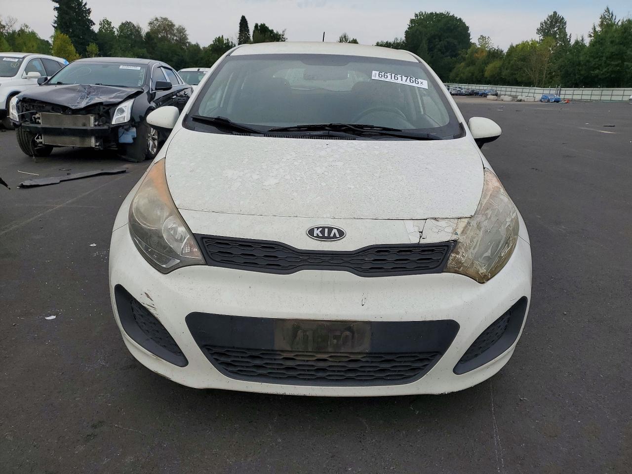 KNADM5A35C6066425 · 2012 KIA RIO · 5/12