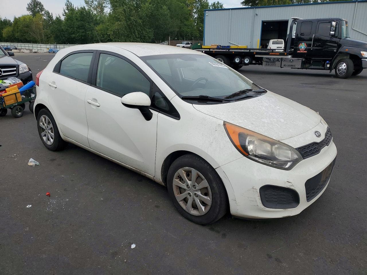 KNADM5A35C6066425 · 2012 KIA RIO · 4/12