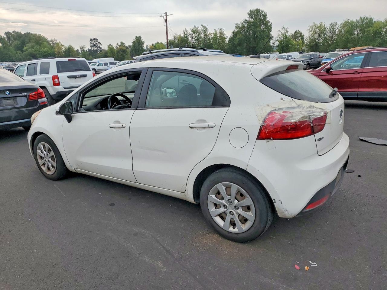 KNADM5A35C6066425 · 2012 KIA RIO · 2/12