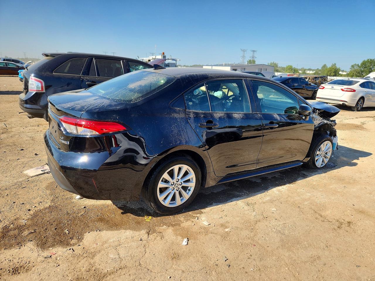 JTDBCMFE7R3030733 · 2024 TOYOTA COROLLA HYBRID · 3/13