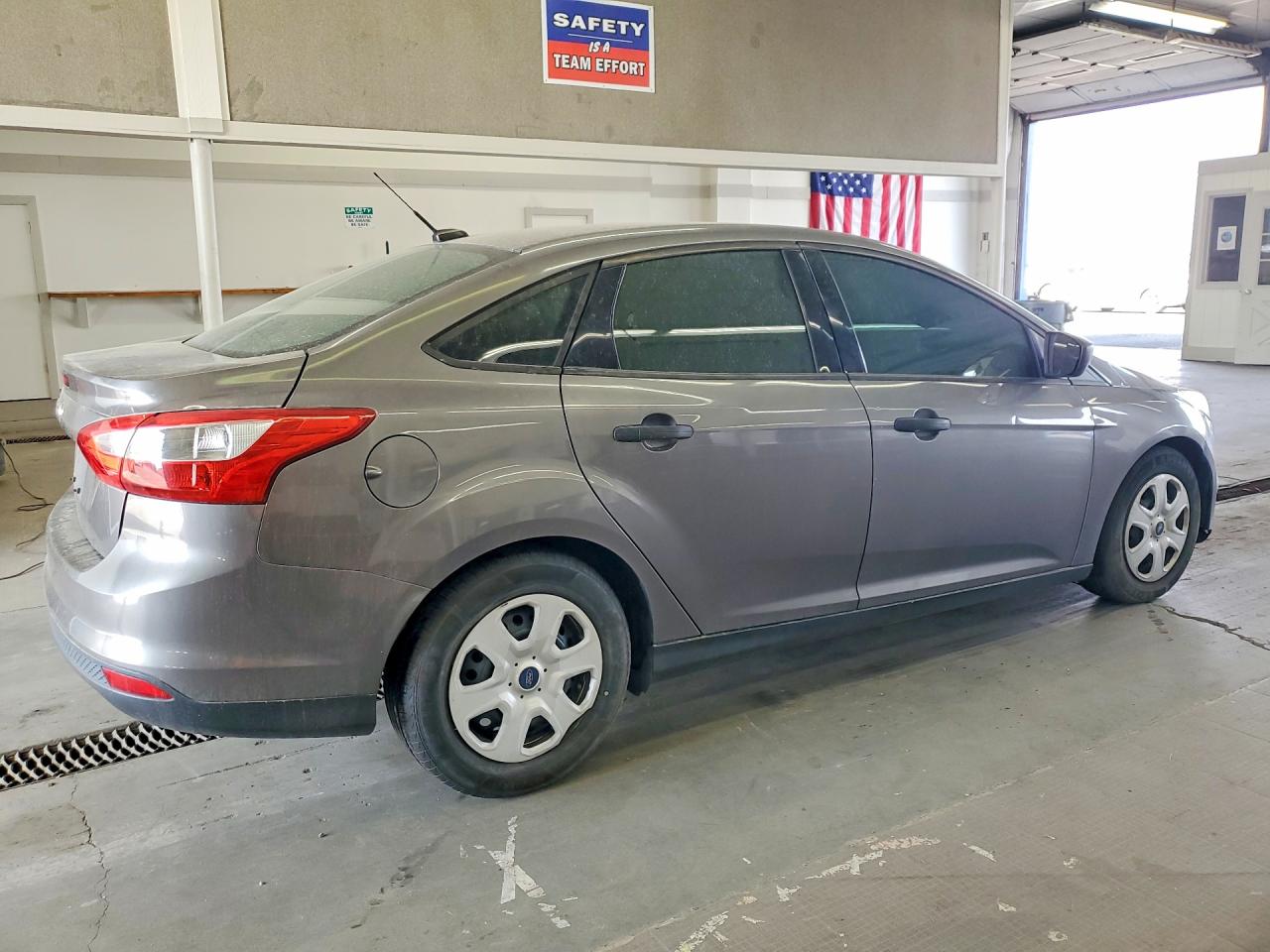 1FADP3E26EL312375 · 2014 FORD FOCUS · 3/13