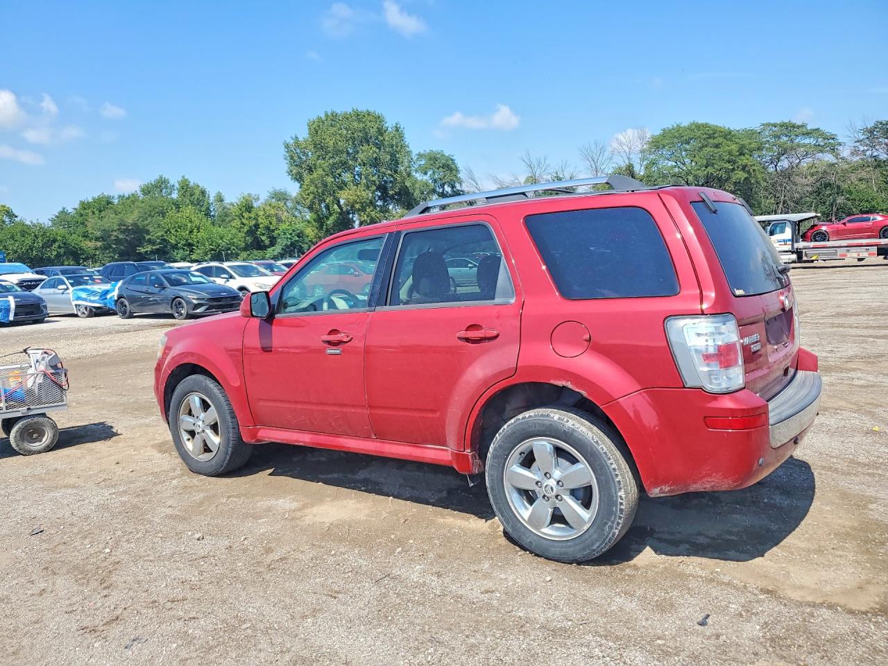 4M2CN8HG2BKJ02299 · 2011 MERCURY MARINER · 2/13