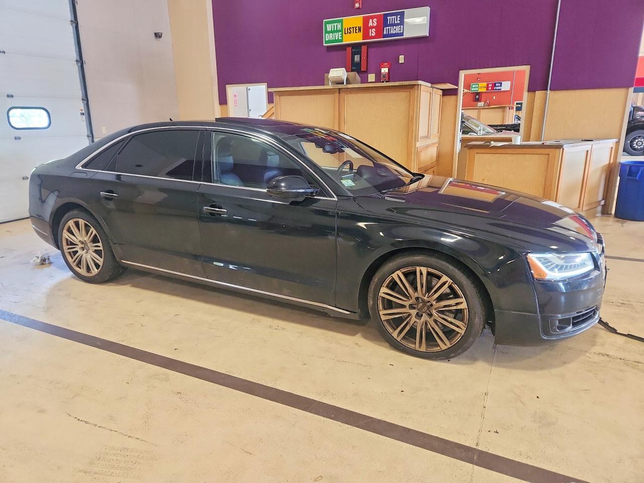 WAU34AFD7GN018183 · 2016 AUDI A8 · 4/12