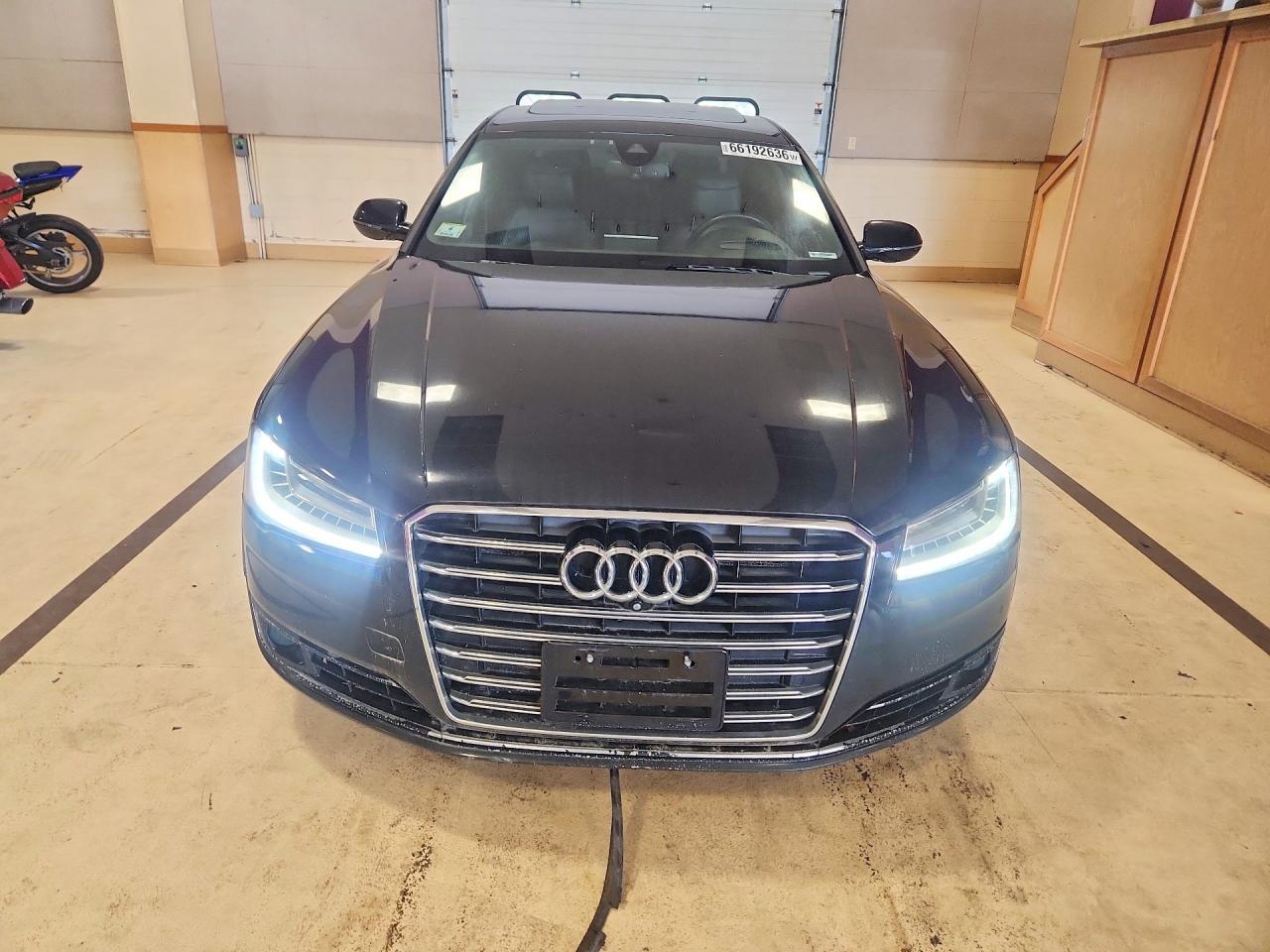 WAU34AFD7GN018183 · 2016 AUDI A8 · 5/12
