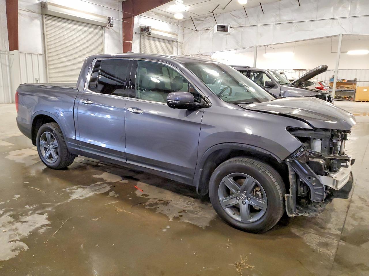 5FPYK3F76PB003572 · 2023 HONDA RIDGELINE · 4/13
