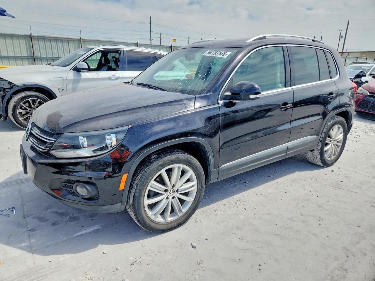 WVGBV7AX4FW596200 · 2015 VOLKSWAGEN TIGUAN