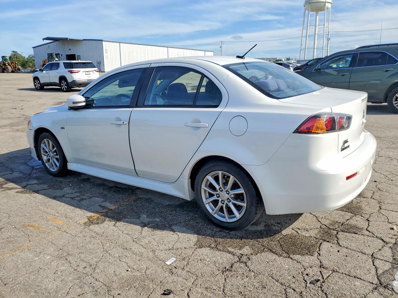 JA32U2FU5GU001973 · 2016 MITSUBISHI LANCER · 2/12