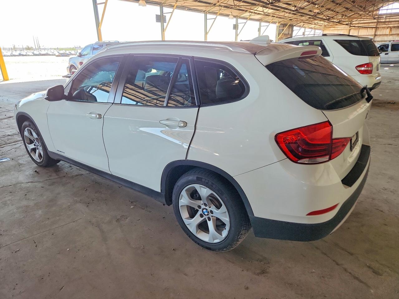 WBAVM1C59DVW45761 · 2013 BMW X1 · 2/12