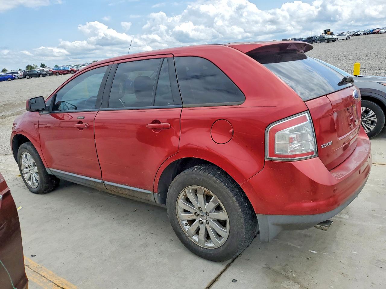2FMDK39C27BB14595 · 2007 FORD EDGE · 2/13