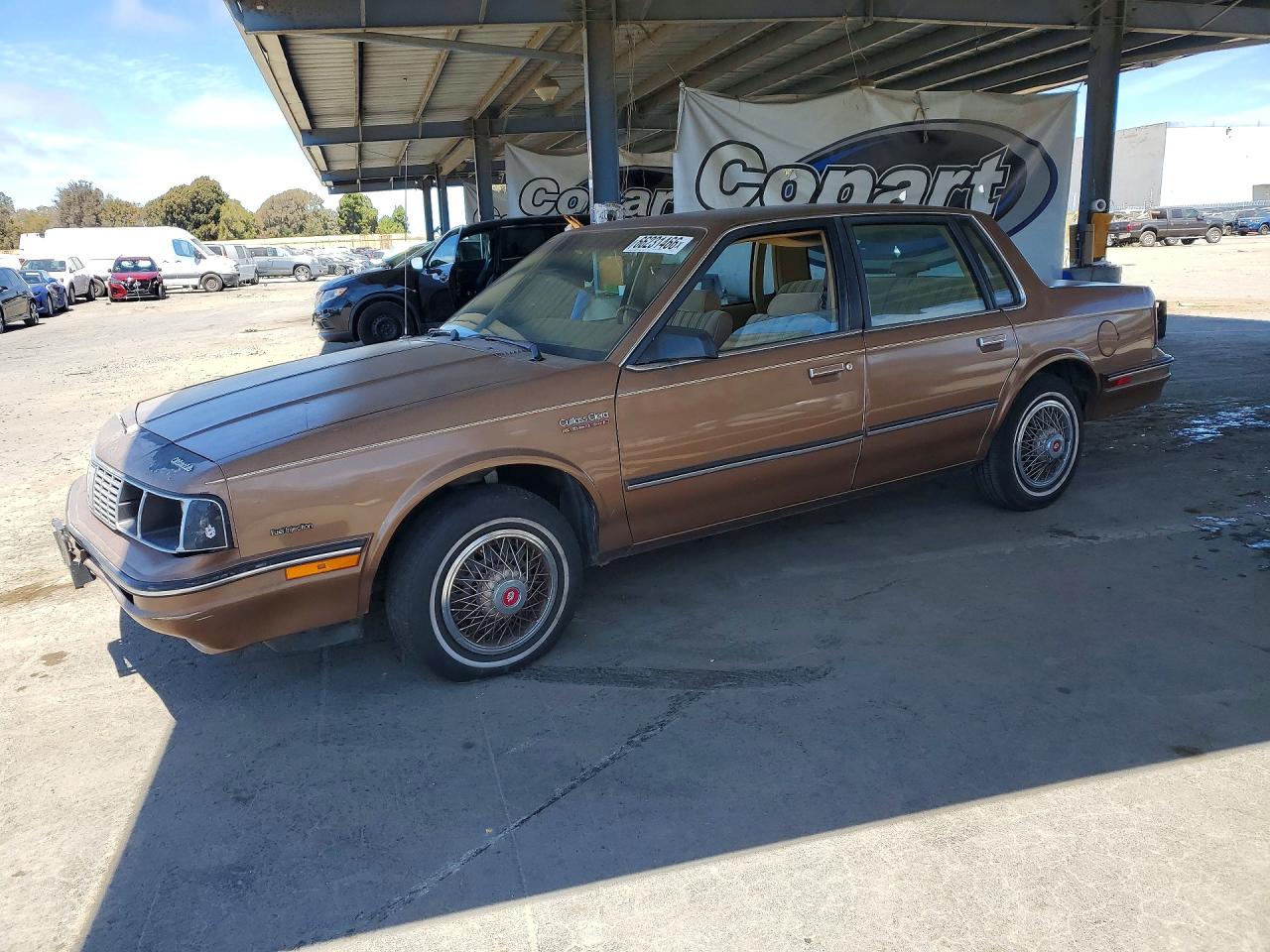 1G3AJ19W4GD328703 · 1986 OLDSMOBILE CUTLASS CIERA