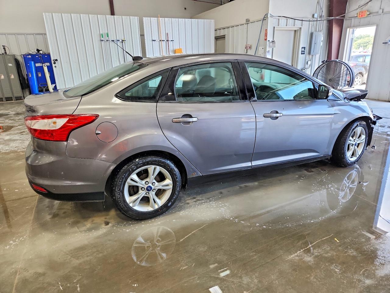 1FADP3F27EL336862 · 2014 FORD FOCUS · 3/12