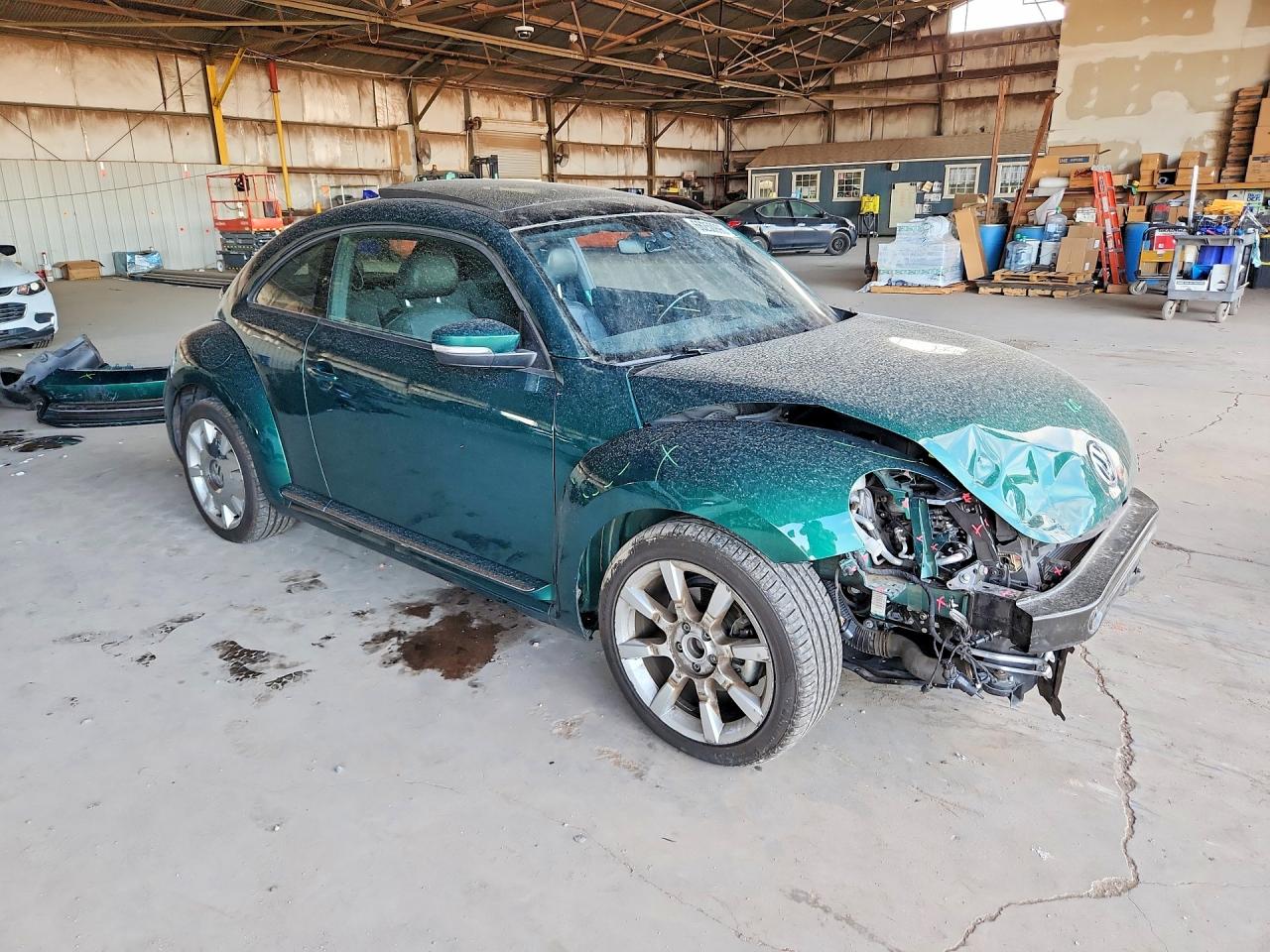 3VWJ17AT2HM618655 · 2017 VOLKSWAGEN BEETLE · 4/13